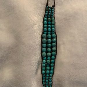 Triple strand turquoise bead bracelet